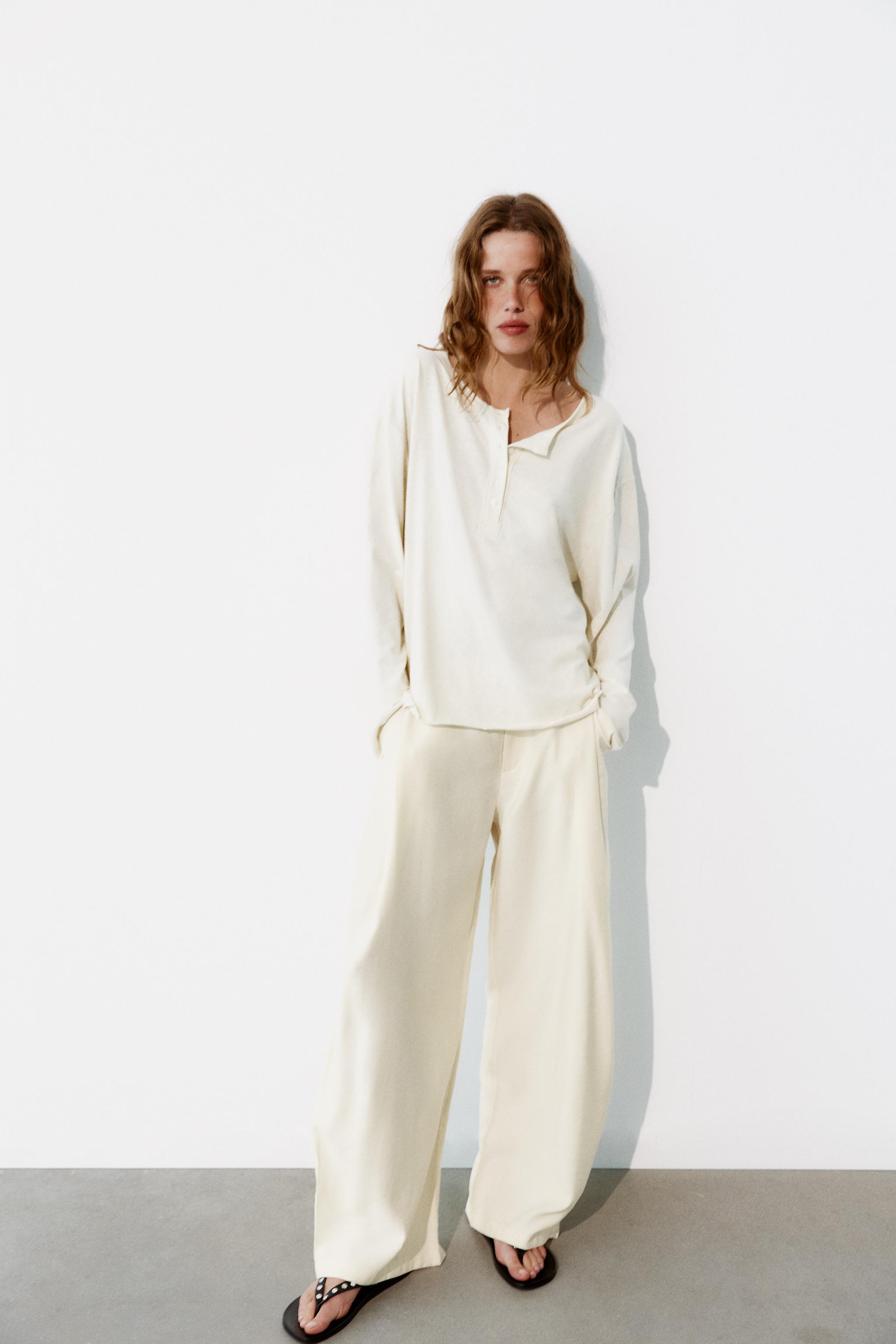 FLOWY PLEATED PANTS